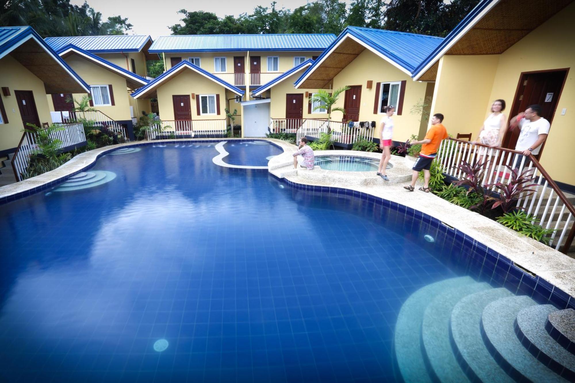 Blue Lagoon Inn & Suites Puerto Princesa Esterno foto